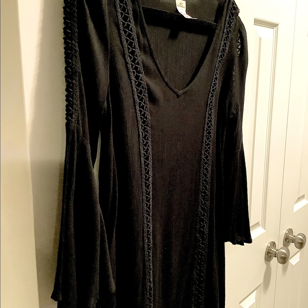 O’Neill,  Swim Coverup, Black, Lace Details, with Trumpet sleeves, size M.  2/30
